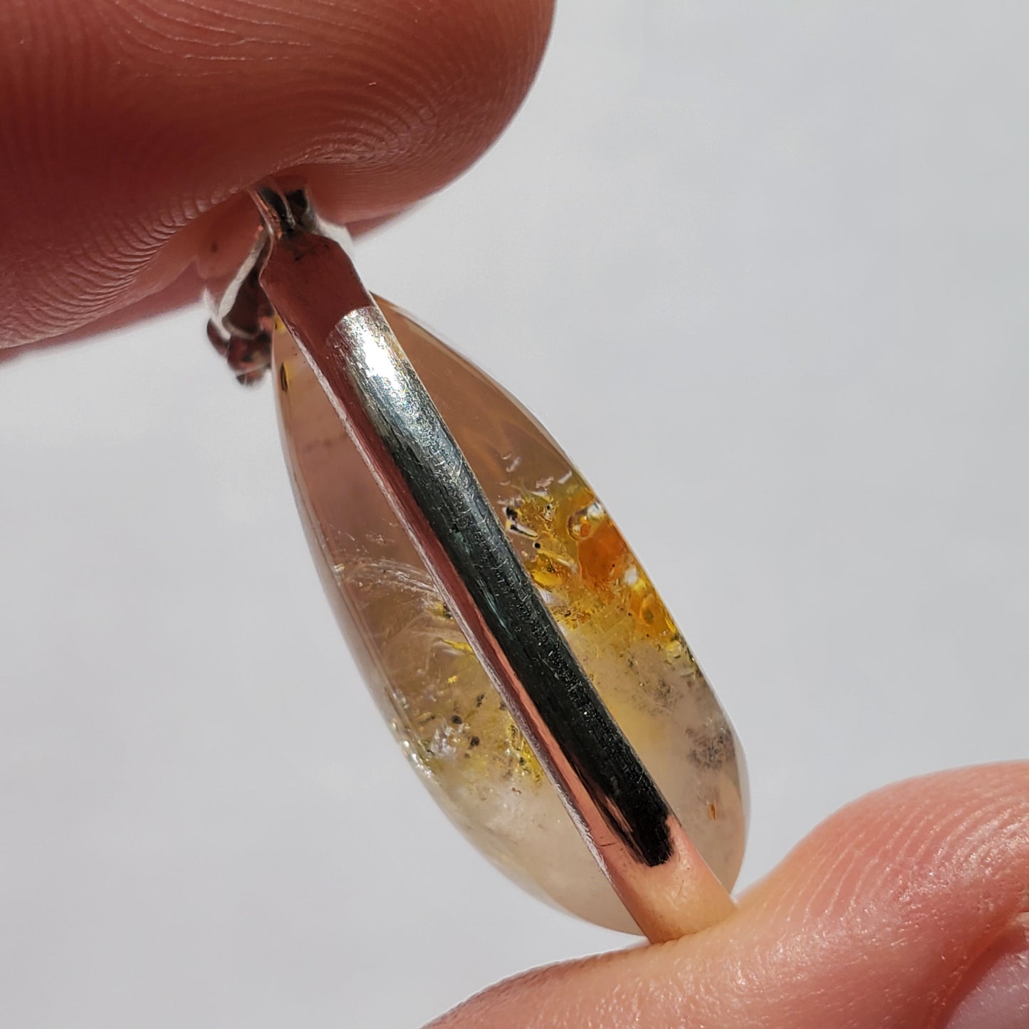 Petroleum Enhydro Crystal Pendant