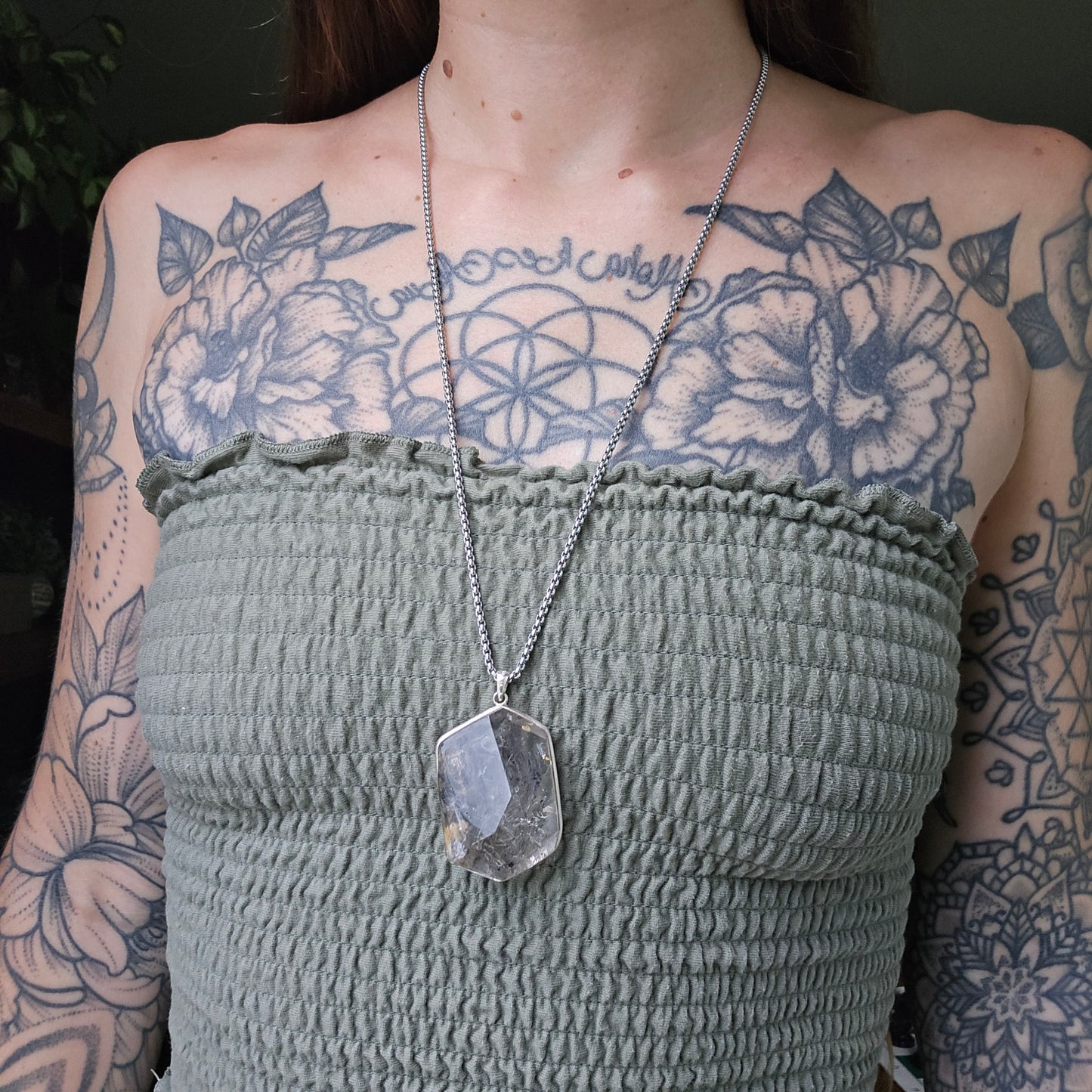 Carbon Included Enhydro Crystal Pendant